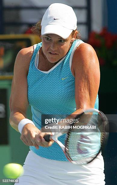 World number one Lindsay Davenport from the US returns the ball to her Swiss opponent Patty Schnyder during their WTA Dubai Women's tournament...