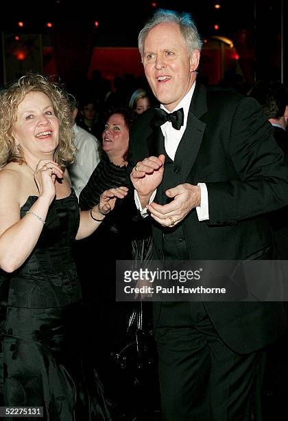 Actor John Lithgow dances with his wife Mary Yeager during the opening night of "Dirty Rotten Scoundrels" after party at Copacobana on March 3, 2005...