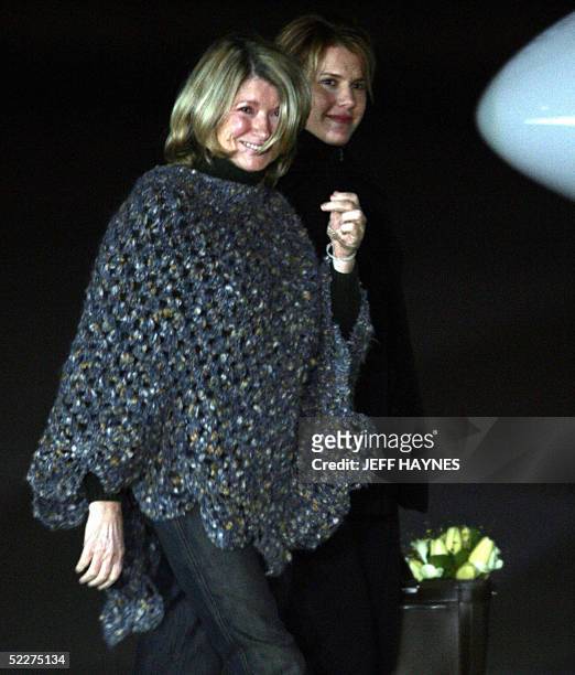 Martha Stewart walks with her daughter Alexis to board a chartered plane at the Greenbrier Valley Airport in Lewisburg, West Virginia 04 March, 2005...