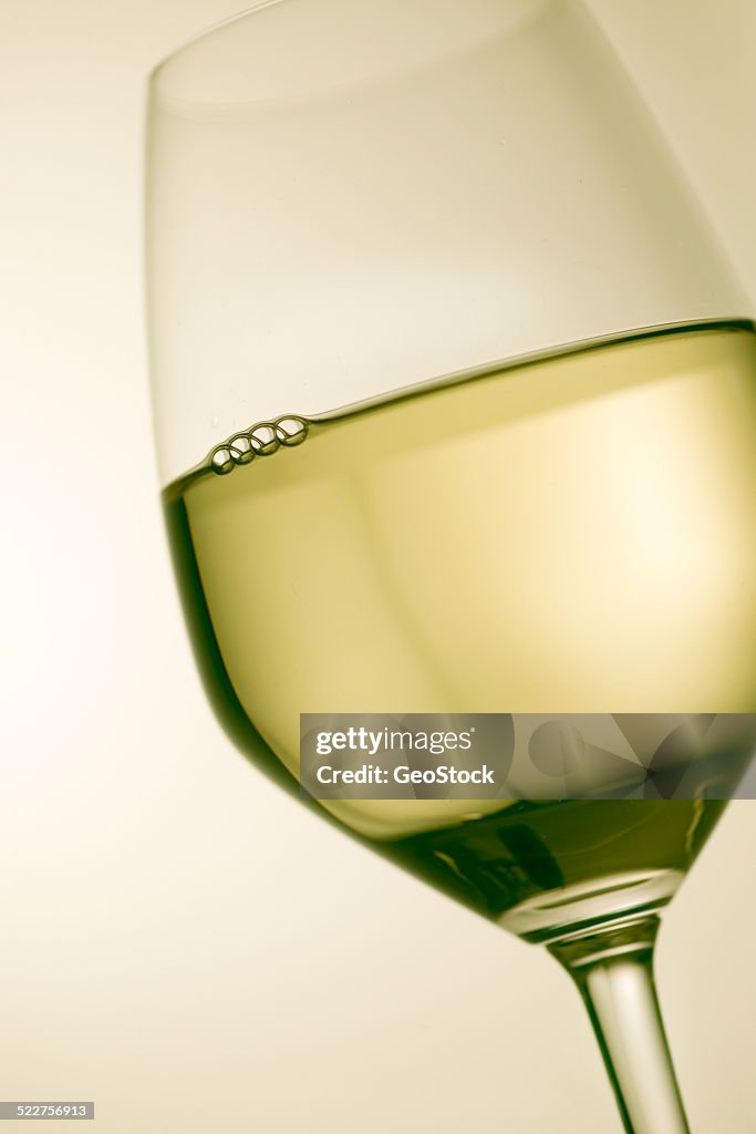 Close view of white wine in a glass