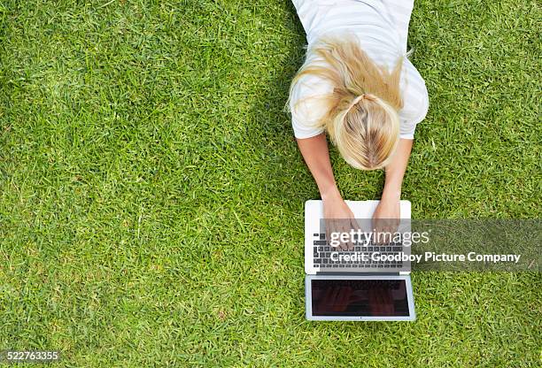 online at the park - laptop outside stock pictures, royalty-free photos & images