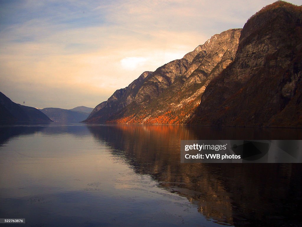 Mountains reflected in N��r��yfjord at Sunset, Norway