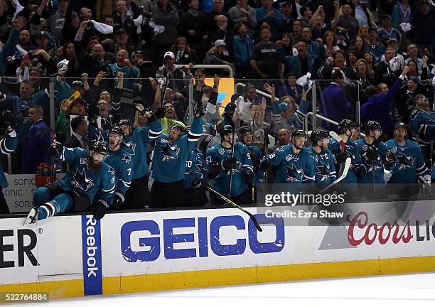 The San Jose Sharks bench reacts after they beat the Los Angeles Kings in Game Four of the Western Conference First Round during the NHL 2016 Stanley...