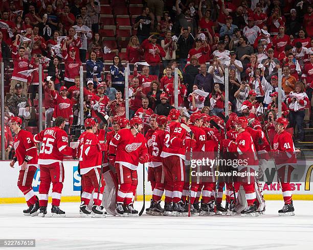 Players from the Detroit Red Wings celebrate their win after Game Three against the Tampa Bay Lightning of the Eastern Conference Quarterfinals...