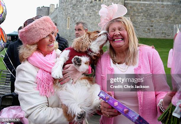 Judy Daley and Anne Daley from Cardiff wait in position for the Queen's 90th Birthday Walkabout on April 21, 2016 in Windsor, England. Today is Queen...