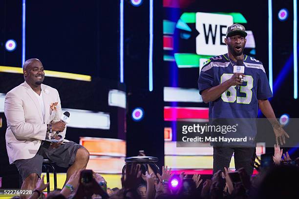 Radio Host Gee Scott and Seattle Seahawks Wide Receiver Ricardo Lockette speak on stage during We Day at KeyArena on April 20, 2016 in Seattle,...