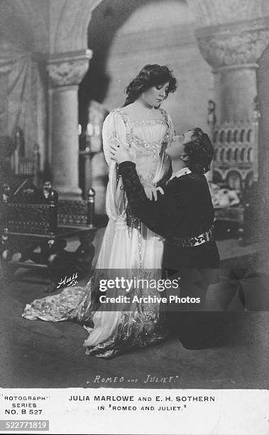 Postcard portrait of actors Julia Marlowe and Edward Sothern, in costume, acting out a scene from the Shakespeare play 'Romeo and Juliet', circa 1890.