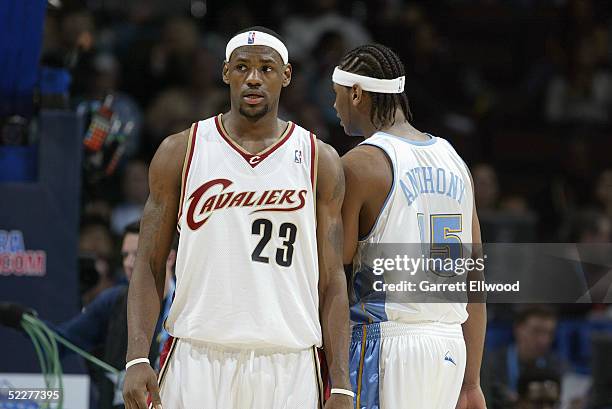 LeBron James and Carmelo Anthony of the Sophmore Team stand on the court in the got milk? Rookie Challenge game against the Rookie Team during 2005...