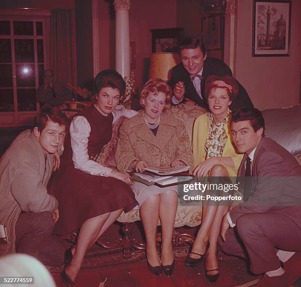 British film producer Betty Box in centre with various actors from the film 'The Wild and the Willing in 1963. From left to right: John Hurt,...