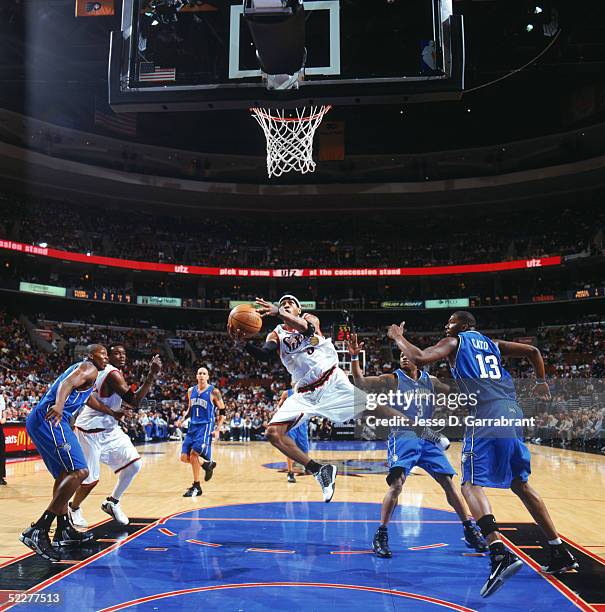 Allen Iverson of the Philadelphia 76ers drives to the basket during a game against the Orlando Magic at Wachovia Center on February 12, 2005 in...
