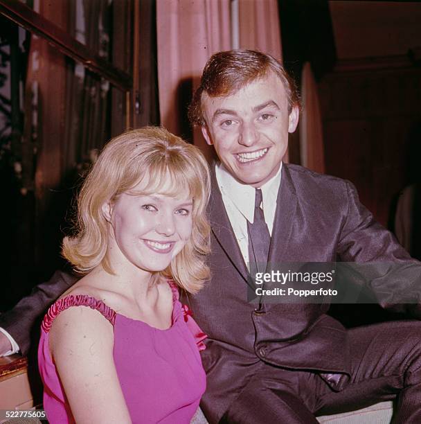 Actress Julie Samuels, star of the film 'Ferry Cross the Mersey', posed with Gerry Marsden from the pop group Gerry and the Pacemakers in 1964.