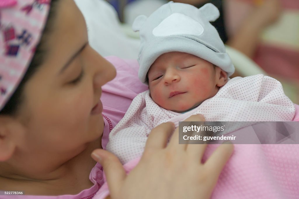 New born baby with his mother