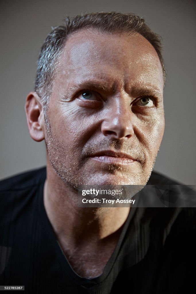 Close-up portrait of middle aged man.