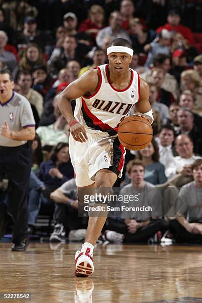 Sebastian Telfair of the Portland Trail Blazers takes the ball down the court against the Indiana Pacers on March 4, 2005 at the Rose Garden Arena in...