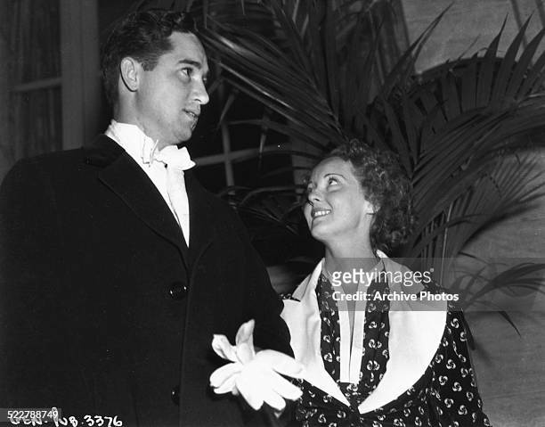 Actress Bette Davis and her husband Harmon Nelson, attending the Academy Awards, where she won the Best Actress award, Hollywood, California,...