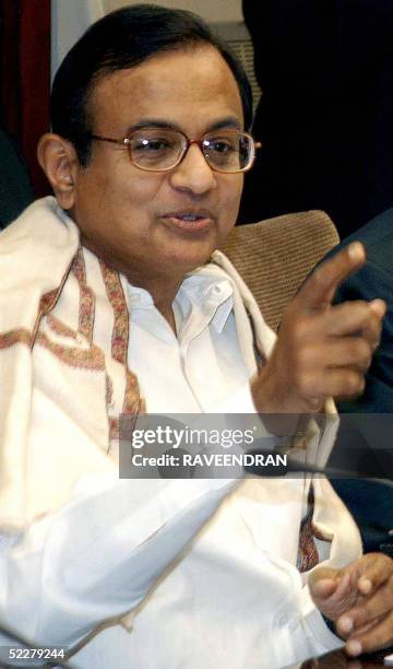 Indian Finance Minister P. Chidambaram gestures as he addresses the annual meeting of Reserve Bank of India Board and Finance Ministry Budget meeting...