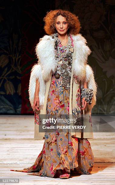 Actress Marisa Berenson presents a creation by Italian designer Antonio Marras for Kenzo during the Ready-to-Wear Autumn/Winter 2005-2006 collection...