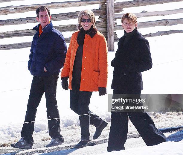 Martha Stewart walks with daughter Alexis and an unidentified man on her estate March 5, 2005 in Katonah, New York. Stewart was released from jail...