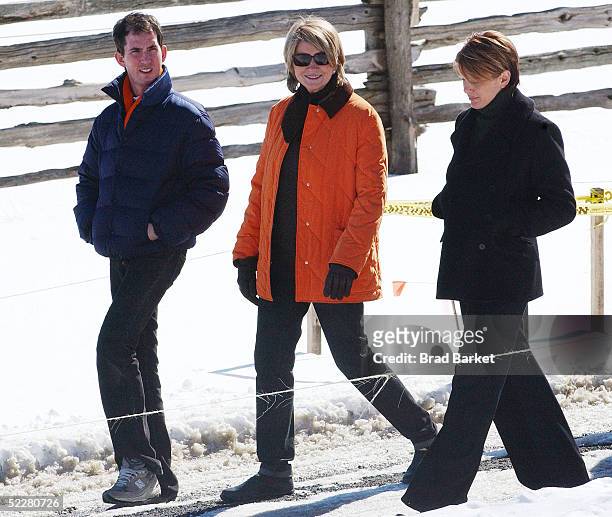 Martha Stewart walks with daughter Alexis and an unidentified man on her estate March 5, 2005 in Katonah, New York. Stewart was released from jail...