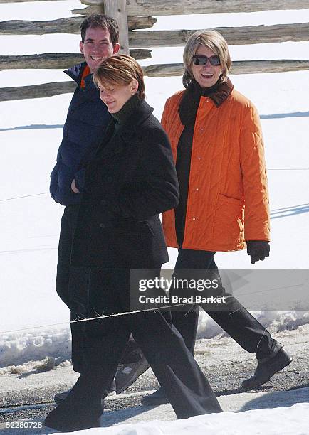 Martha Stewart walks with daughter Alexis and an unidentified man on her estate March 5, 2005 in Katonah, New York. Stewart was released from jail...