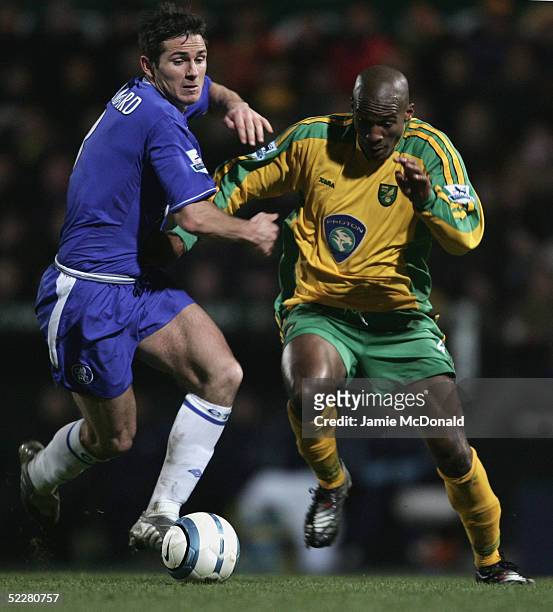 Frank Lampard of Chelsea battles with Damien Francis of Norwich during the Barclays Premiership match between Norwich City and Chelsea at Carrow Road...