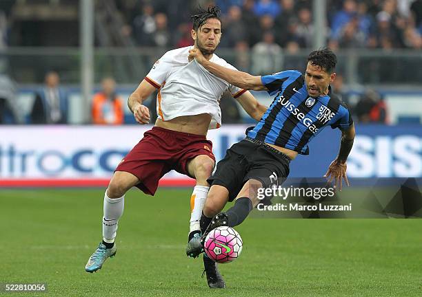 Marco Borriello of Atalanta BC competes for the ball with Konstantinos Manolas of AS Roma during the Serie A match between Atalanta BC and AS Roma at...