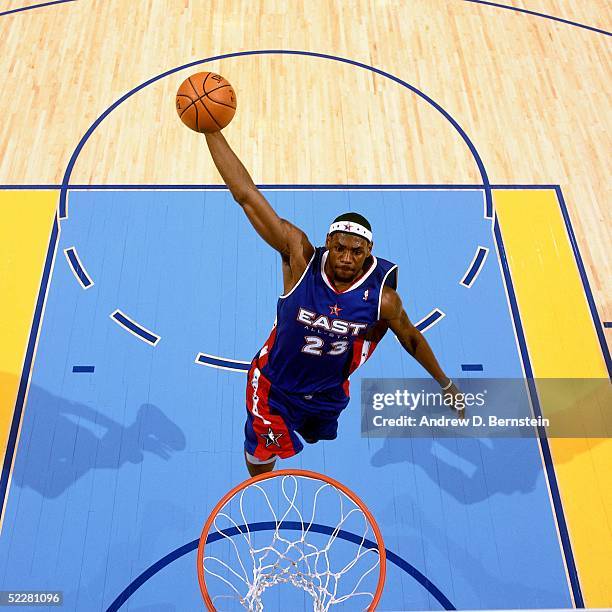 LeBron James of the Eastern Conference All-Stars dunks against the Western Conference All-Stars during the 2005 All-Star Game on February 20, 2005 at...