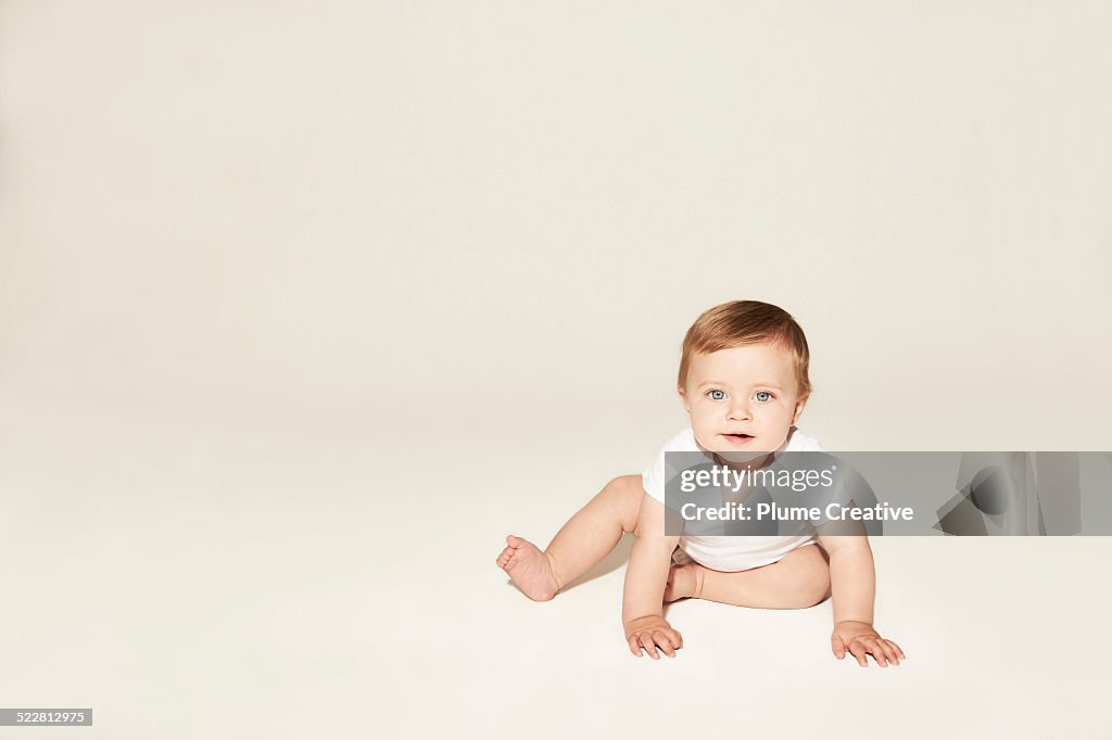 Cute baby crawling on the floor