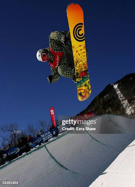 Mason Aguirre of the USA, who came in second place, competes in the Men's Half-pipe Finals in the Nokia Snowboard FIS World Cup on March 5, 2005 at...