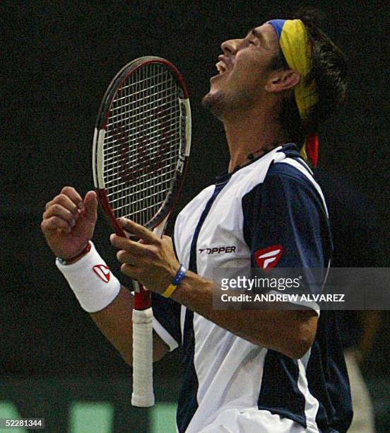Venezuelan tennis player Jose Antonio de Armas celebrates his victory against Peru, in the double match for the Davis Cup in Caracas, 05 March 2005....