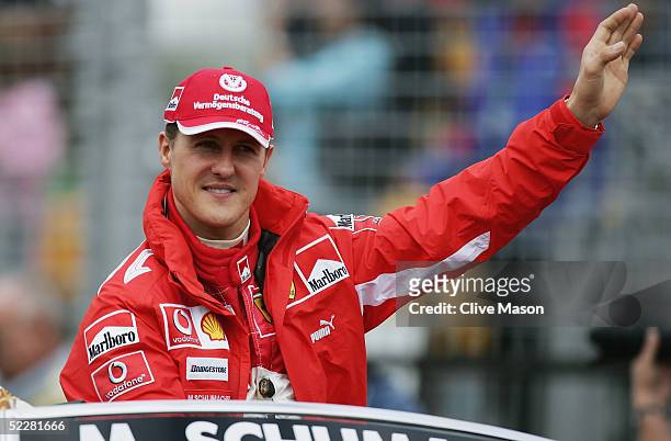 Michael Schumacher of Germany and Ferrari during the drivers parade prior to the Australian Formula One Grand Prix at Albert Park on March 6, 2005 in...