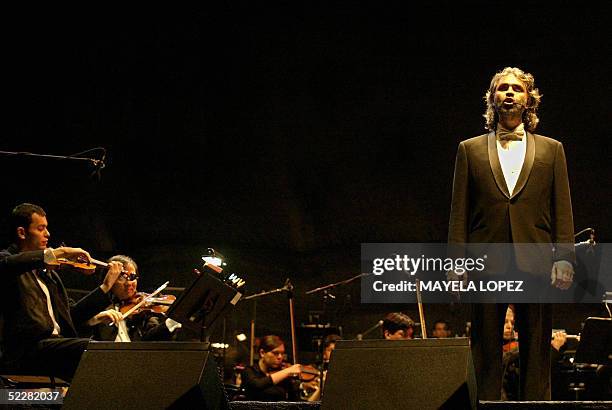 Italian tenor Andrea Bocelli sings at Ricardo Saprissa Stadium in San Jose during a concert with the Costa Rican National Philharmonic Orchestra and...