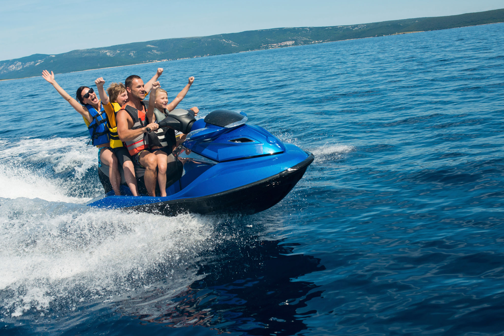 family jet skiing