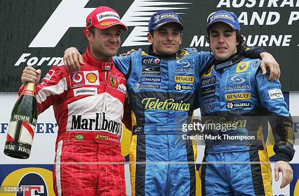 Rubens Barrichello of Brazil and the Ferrari Team, Giancarlo Fisichella of Italy and the Renault Team, Fernando Alonso of Spain and the Renault Team...