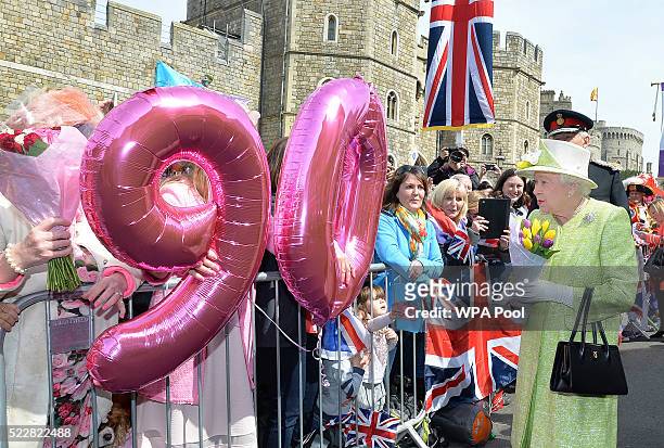 Queen Elizabeth II meets the public on her 90th Birthday Walkabout on April 21, 2016 in Windsor, England. Today is Queen Elizabeth II's 90th...