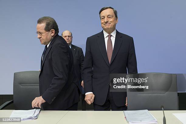 Mario Draghi, president of the European Central Bank , right, and Vitor Constancio, vice president of the European Central Bank, arrive for a news...