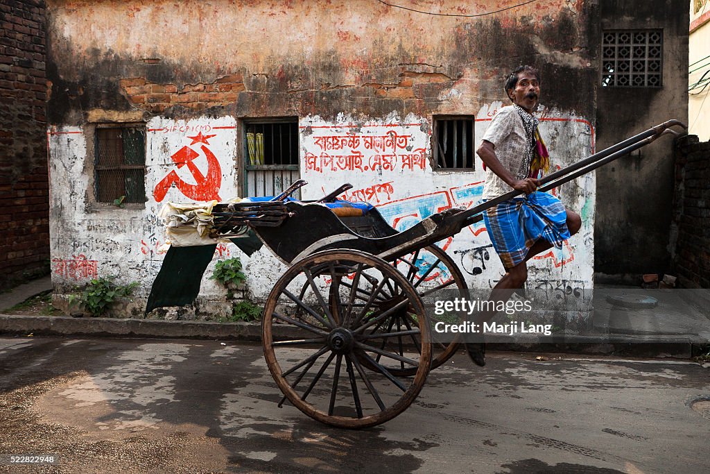 Allah Rakha Rickshaw Jumping rickshaw-wallah in the streets of Kolkata . West Bengal ...