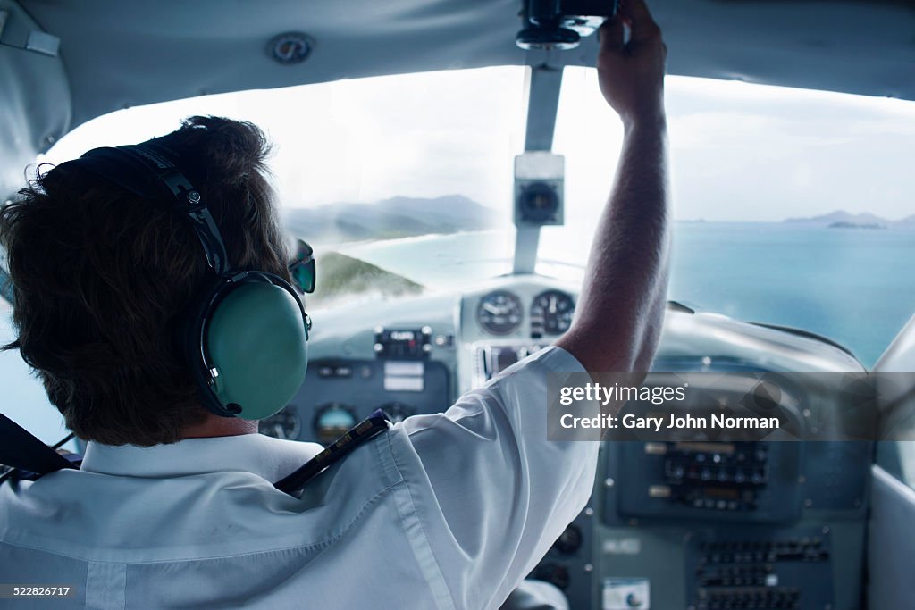 Pilot in cockpit of seaplane