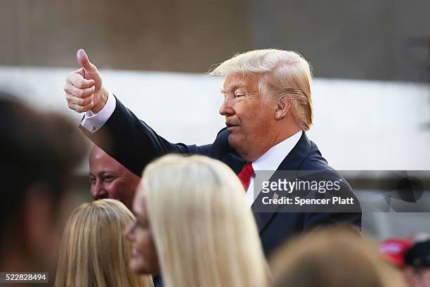 Republican presidential candidate Donald Trump waves to members of the audience while appearing at an NBC Town Hall at the Today Show on April 21,...