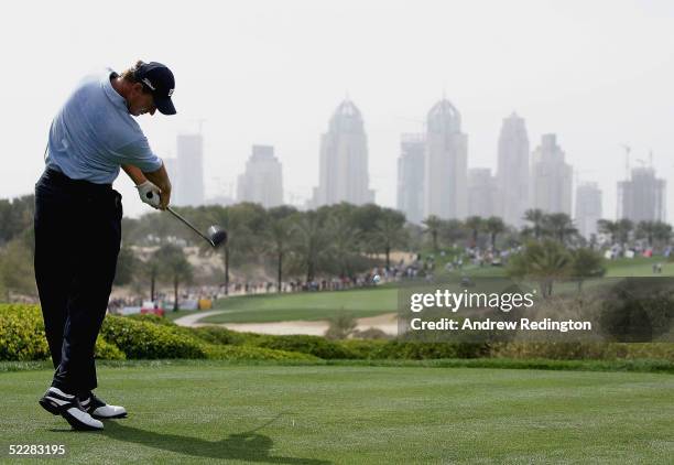 Ernie Els of South Africa tees off on the eighth hole during the final round of the 2005 Dubai Desert Classic on the Majilis Course at the Emirates...