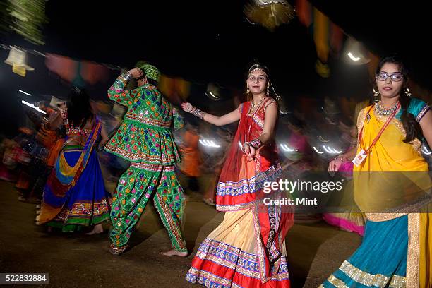 Garba Images People enjoying Garba dance in colorful traditional Gujrati dresses ...
