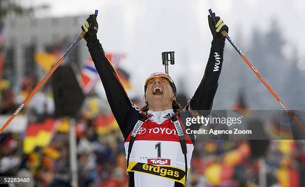 Uschi Disl of Germany celebrates after the Women's 10km Pursuit in the Biathlon World Cup event March 6, 2005 in Hochfilzen, Austria.