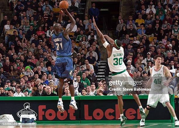 Kevin Garnett of the Minnesota Timberwolves shoots against Mark Blount of the Boston Celtics March 6, 2005 at the Fleet Center in Boston,...