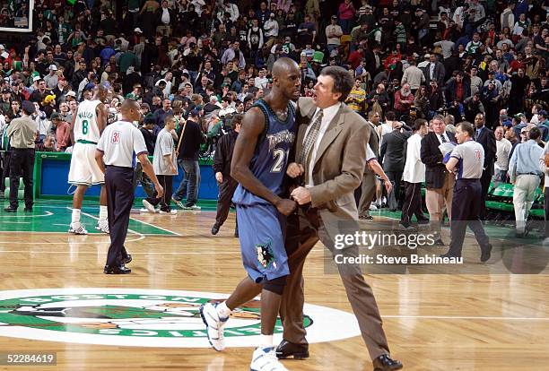 Coach Kevin McHale congratulates Kevin Garnett of the Minnesota Timberwolves in there victory over the Boston Celtics March 6, 2005 at the Fleet...