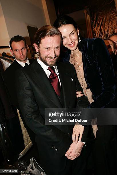 Designer Stefano Pilati and L'Wren Scott appear backstage at the Yves Saint Laurent fashion show during Paris Fashion Week Ready To Wear...