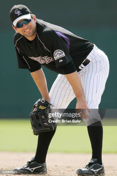 First baseman Todd Helton of the Colorado Rockies looks toward the dugout during a spring training game against the Texas Rangers on March 6, 2005 at...