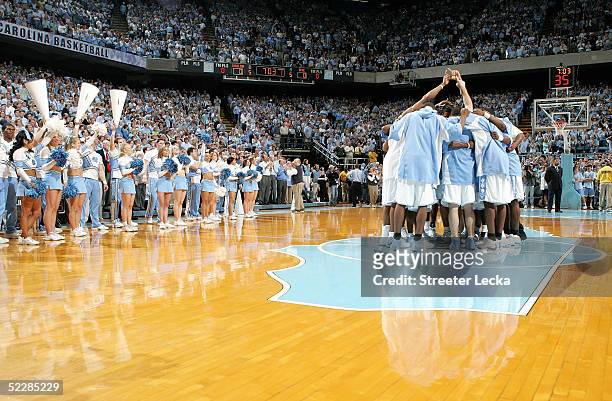 The North Carolina Tar Heels huddle up before the start of their game on Senior Day against the Duke Blue Devils on March 6, 2005 at the Dean E....