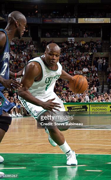 Kevin Garnett of the Minnesota Timberwolves defends against Antoine Walker of the Boston Celtics March 6, 2005 at the Fleet Center in Boston,...