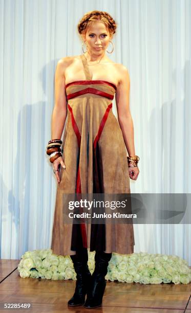 Actress/singer Jennifer Lopez poses for photographers during a press conference on March 7, 2005 in Tokyo, Japan. Lopez is in Japan to promote her...