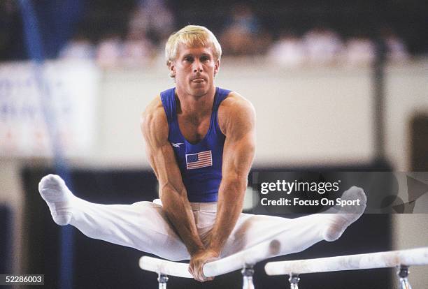 Bart Conner goes through his routine on the parallel bars circa 1980's.